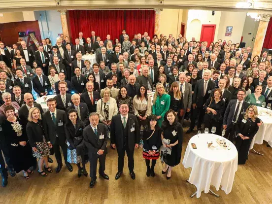 A photo of the attendees of the GCIAG 100th Anniversary event