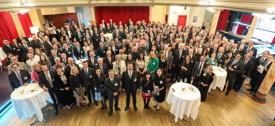 A photo of the attendees of the GCIAG 100th Anniversary event